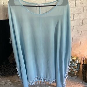 Perfect for Easter! 
Powder blue lightweight poncho
One size